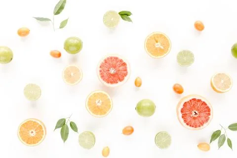 Creative pattern made of summer tropical fruits: grapefruit, orange, lemon, lime 스톡 사진