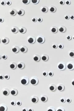 Creative pattern from plastic googly eyes. Foto stock