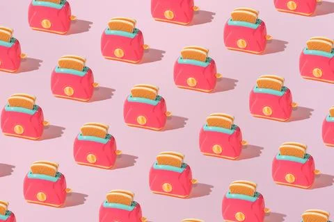 Creative pattern with slices of toast bread and toaster flat lay on pastel pi 스톡 사진