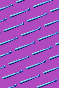 Creative pattern toothbrush white toothpaste purple background flat lay top.. Foto stock