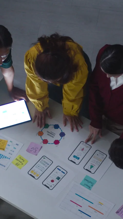 Creative people brainstorming meeting ideas mobile application software. Stock Footage 337020685