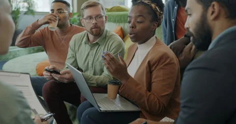 Creative people diverse group talking brainstorming discussing business Stock Footage 250779555