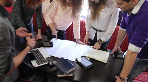 Creative people working together on paperwork Stock Footage 60586934