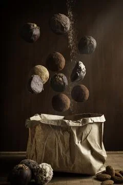 Creative photography composition of delicious floating chocolate truffles and Stock Photos