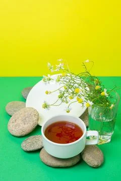 Creative photography of tea on a colored background.  Stock Photos