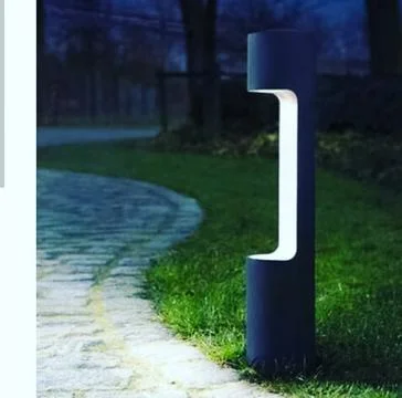 Creative pillar on sidewalk with lighting. Stock Photos