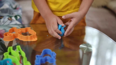 Creative Play using Colorful Dough along with Fun Cookie Cutters for crafting Stock Footage 305263702