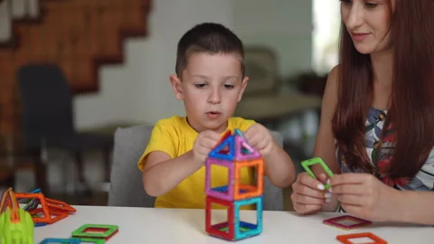 Creative Playtime Exploring the Joys of Building with Colorful Magnets Together Stock Footage 305268298