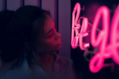 Creative portrait in neon light Stock Photos