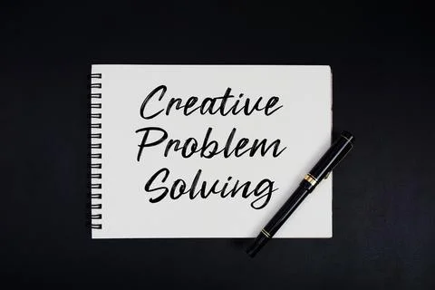 Creative Problem Solving text written on notepad Stock Photos