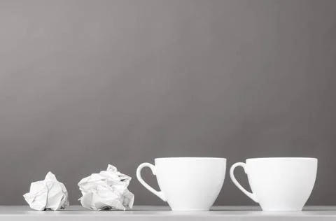 Creative process creative process. crumpled wads and cup on gray Copyright... 스톡 사진