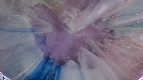 Creative process using alcohol ink and epoxy resin on a flat surface Stock Photos
