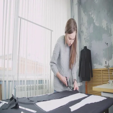 Creative profession. Woman creates designer clothes. Seamstress Vidéo 69540092