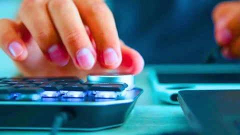 Creative professional using specialized editing console for digital work Stock-Footage 341801973