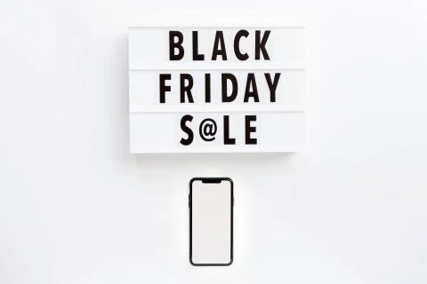Creative promotion composition Black friday sale text on lightbox and mobile  Stock Photos