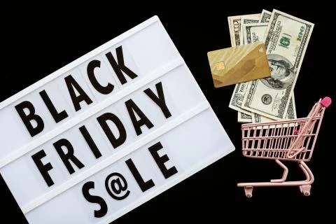 Creative promotion composition Black friday sale text on lightbox on black ba Stock Photos
