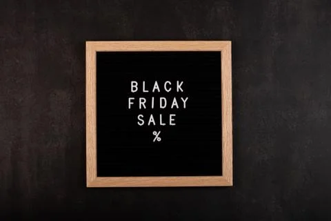 Creative promotion composition for Black friday on black background. Flat lay Stock-Fotos