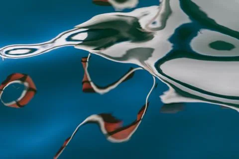 Creative reflection of boat in water. Abstract background Stock Photos