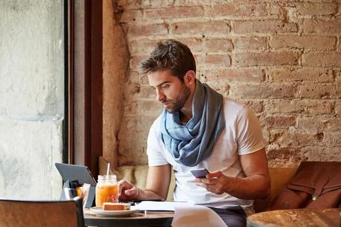 Creative, remote work and man with tech in cafe, paid advertising or conten.. Stock Photos