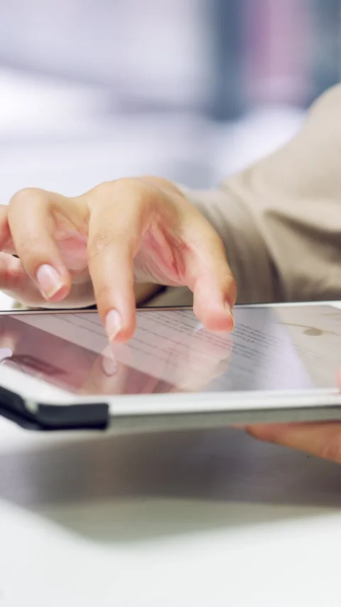 Creative, research and hands with tablet in office, review and plan for magazine Stock Footage 336733686