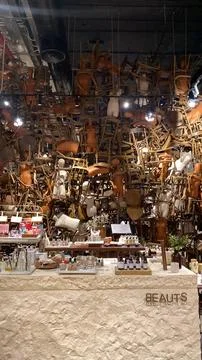 Creative Retail Store Interior With Hanging chairs. Stock Photos