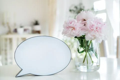 Creative romantic composition of lightbox with copy space and bouquet of pink Stock Photos