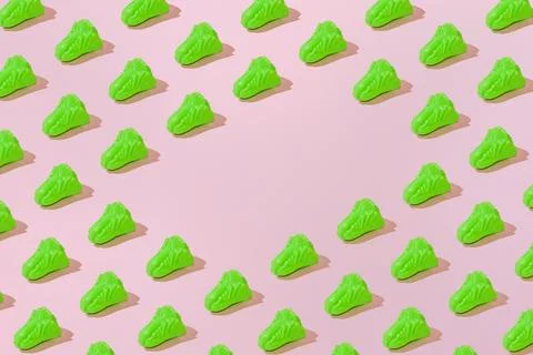 Creative salad pattern flat lay on pastel pink background minimalism copy spa Stock Photos