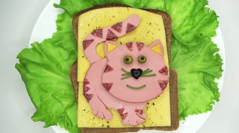 Creative sandwich with cheese and salame cat shape Stock Footage 35765447