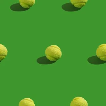 Creative seamless pattern with green tennis ball on green background. Sweet t Foto stock