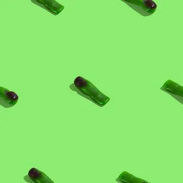 Creative seamless pattern with jelly finger zombie on green background. Hallo Stock Photos