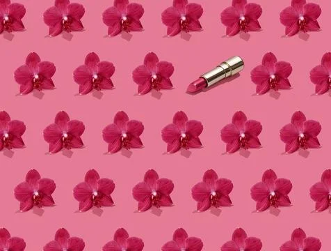 Creative seamless pattern of vivid pink orchid flowers and golden lipstick on Stock Photos