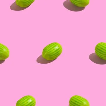 Creative seamless pattern with watermelon candy on pink background. Candy abs Stock Photos