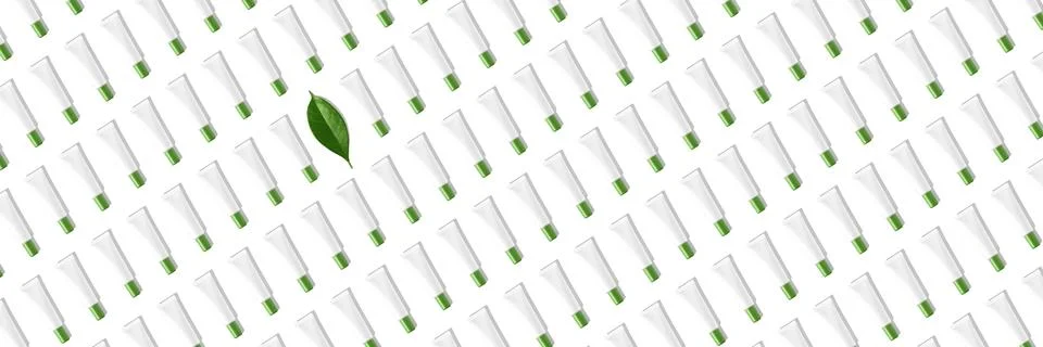 Creative seamless pattern of white cosmetic tubes and green leaf on white Stock Illustration