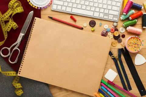 Creative sewing and craft workspace with tools and materials Stock Photos