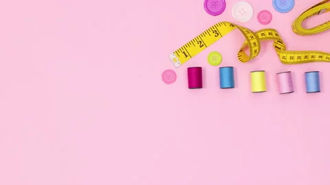 Creative sewing and knitting craft items appear on top. Stop motion flat lay Stock Footage 154963305