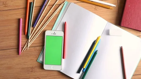 Creative shoot of art studio workspace desk with smartphone mobile and notebook 스톡 동영상 89773519