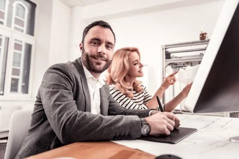 Creative smart architects creating plan of building Stock Photos