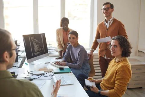Creative Software Development Team in Office Stock Photos