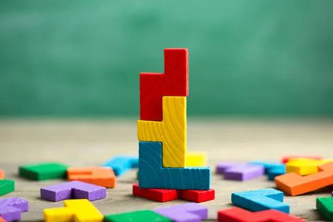 Creative solution for idea - business concept, jigsaw puzzle on the blackboar Stock Photos