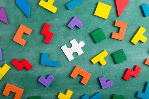 Creative solution for idea - business concept, jigsaw puzzle on the blackboar Foto stock