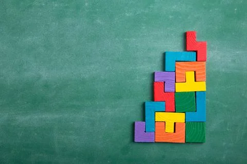 Creative solution for idea - business concept, jigsaw puzzle on the blackboar Foto stock