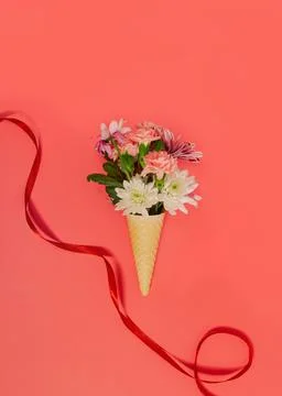 Creative spring layout made of flowers with copy space. Flat lay bouquet. Stock Photos