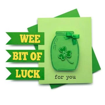 Creative St. Patricks Day concept photo of a bottle with shamrocks made of paper Stock Photos