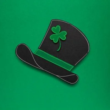 Creative St. Patricks Day concept photo of a leprechauns hat made of paper on gr Stock Photos