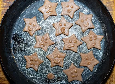 Creative star-shaped cookies with various facial expressions Stock Photos