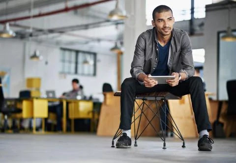 Creative, startup or man with a tablet, thinking or planning with ideas Foto stock
