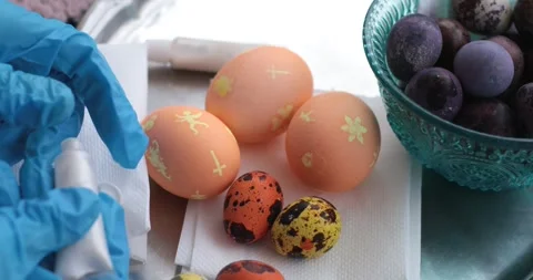 Creative steps of egg painting process with hidden Easter eggs for festive fun Stock Footage 306067821