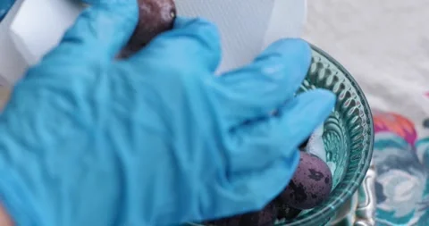 Creative steps of egg painting process using pearl finish. Hidden Easter eggs Stock Footage 306068000