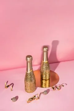 Creative still life composition with mini bottles of champagne Stock Photos