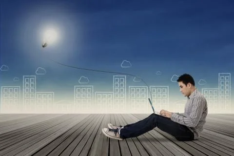 Creative student using laptop  Ilustración de archivo